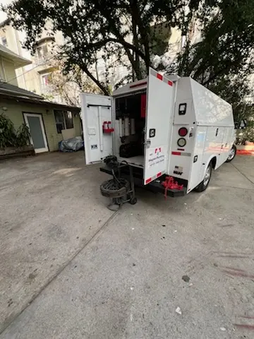 Magnet Plumbing service vehicle on-site for Grease Trap Cleaning in Sanctuary